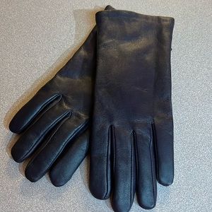 Vintage Aris Isotoner women’s black leather gloves, size 8.0